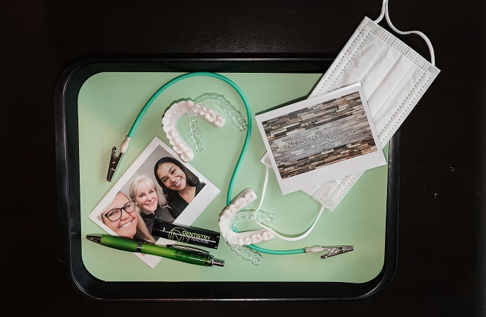 Photo of dental staff and photo of a doctor and team