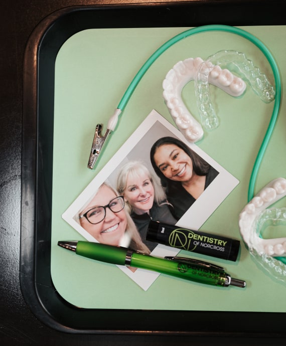 A photo of dental things and photo our doctors and team member 