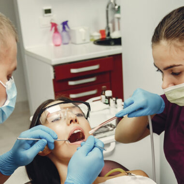 Hamilton dentist treating their patient
