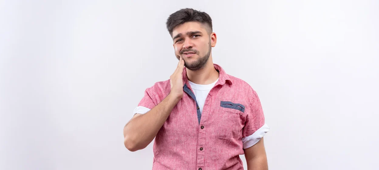 Why Do My Teeth Feel Loose? Causes & Treatment