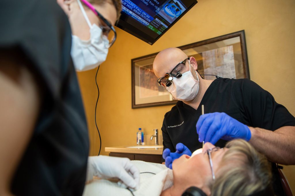 dr pruett performing bone grafting procedure Tavares, FL