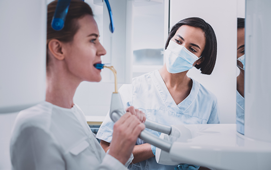 Dental patient having a C T cone beam scan taken of their mouth and jaws