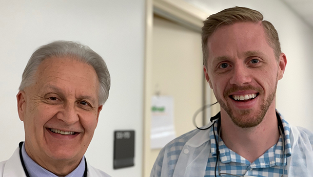 Auditorium of people watching a lecture