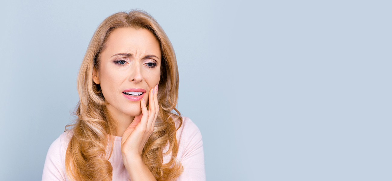 Why do my teeth feel loose and hurt?